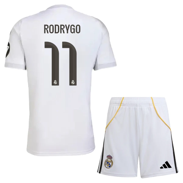 Maglia Real Madrid Rodrygo Goes 11 Bambino Gara Home 2025/26 Maglia Real Madrid Rodrygo Goes 11 Bambino Gara Home 2025/26
